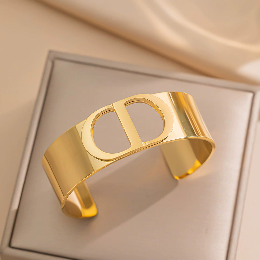 Fashionable Wide C-Shaped Titanium Steel Bracelet – CD Letter Design, 18K Gold Plated