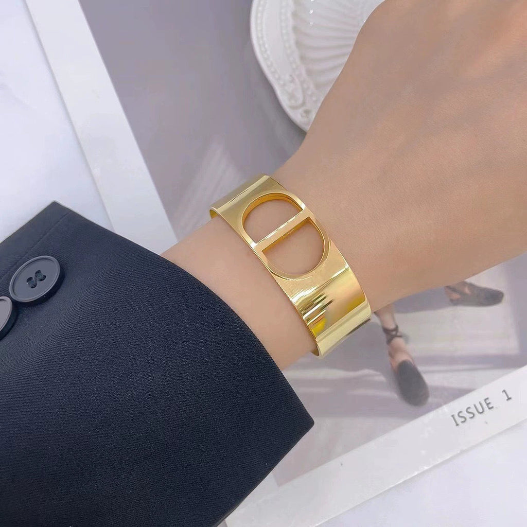 Fashionable Wide C-Shaped Titanium Steel Bracelet – CD Letter Design, 18K Gold Plated