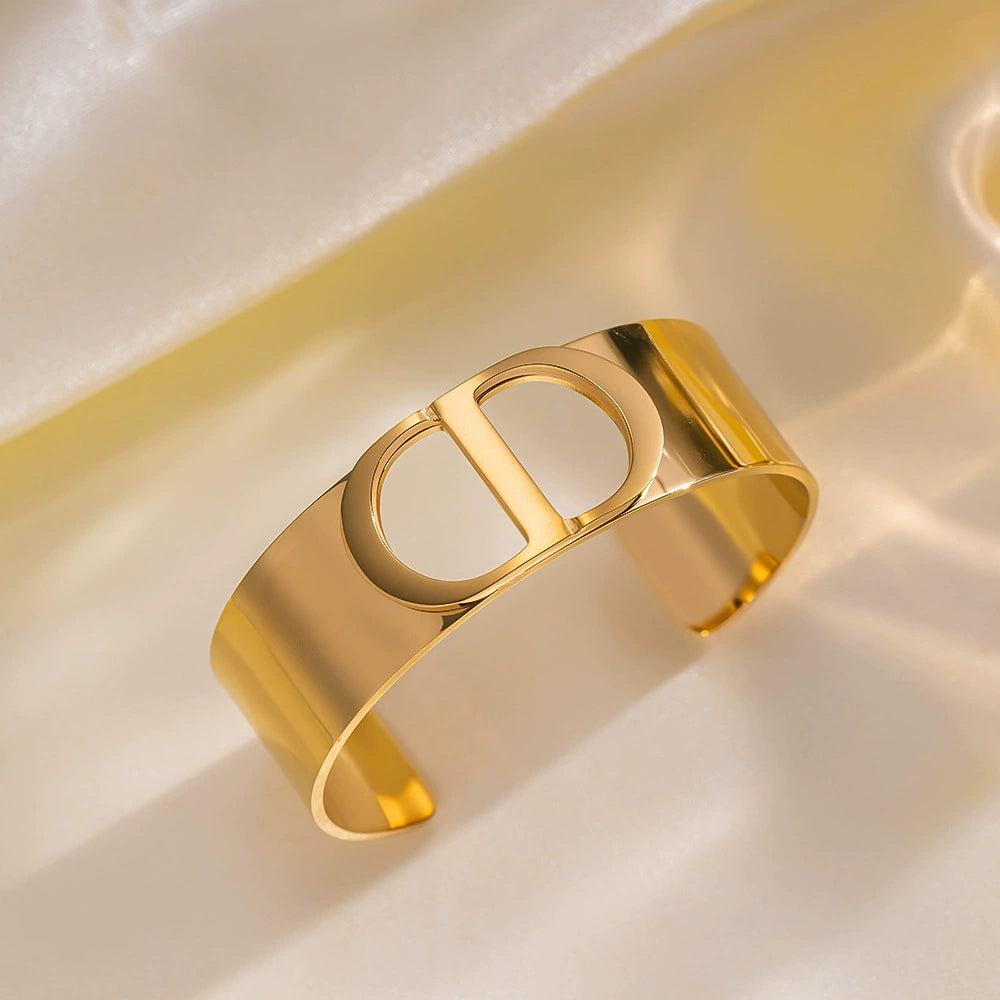 Fashionable Wide C-Shaped Titanium Steel Bracelet – CD Letter Design, 18K Gold Plated