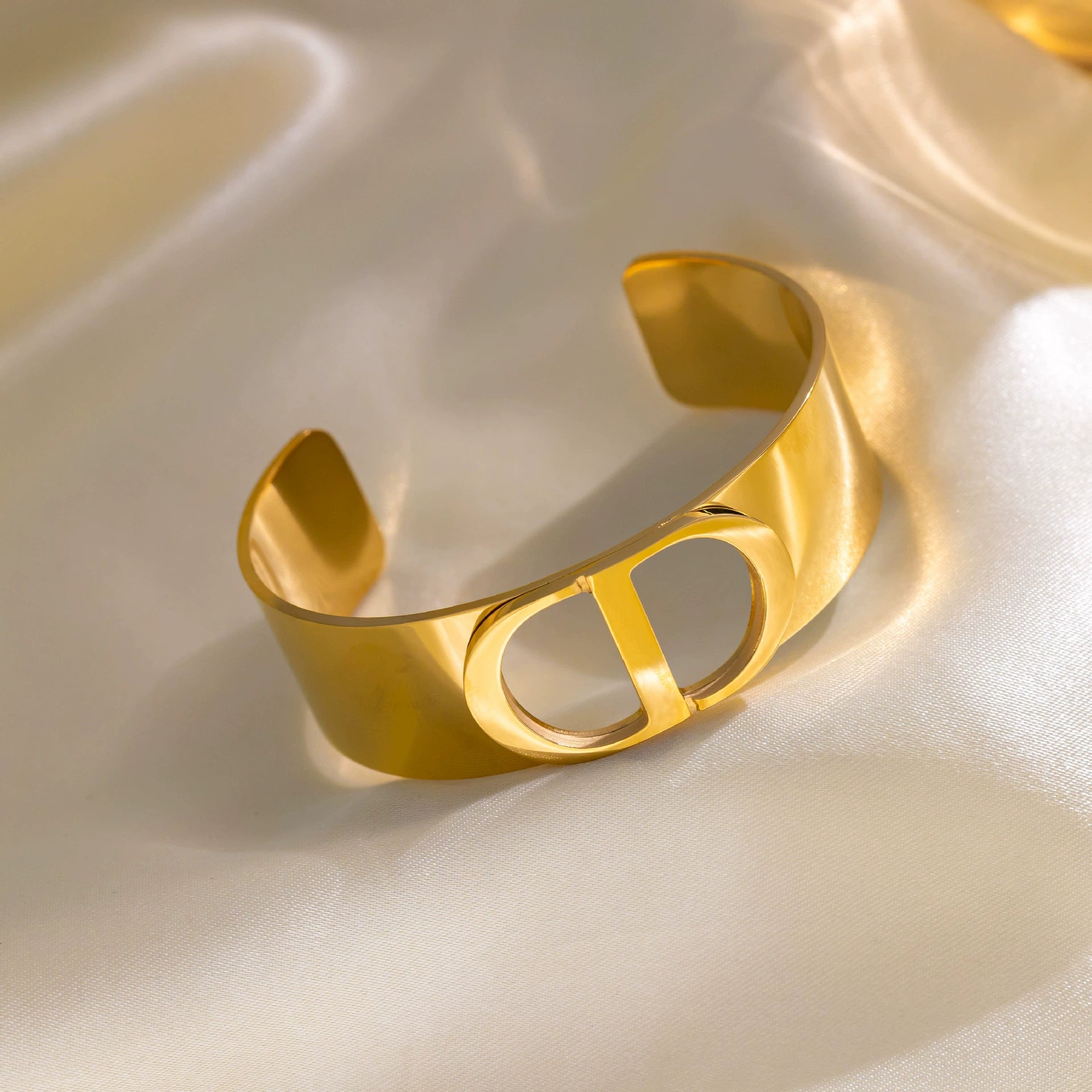 Fashionable Wide C-Shaped Titanium Steel Bracelet – CD Letter Design, 18K Gold Plated